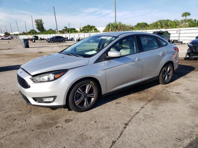 FORD FOCUS SE 2018 с VIN 1FADP3F28JL299587 - Снимка от търг