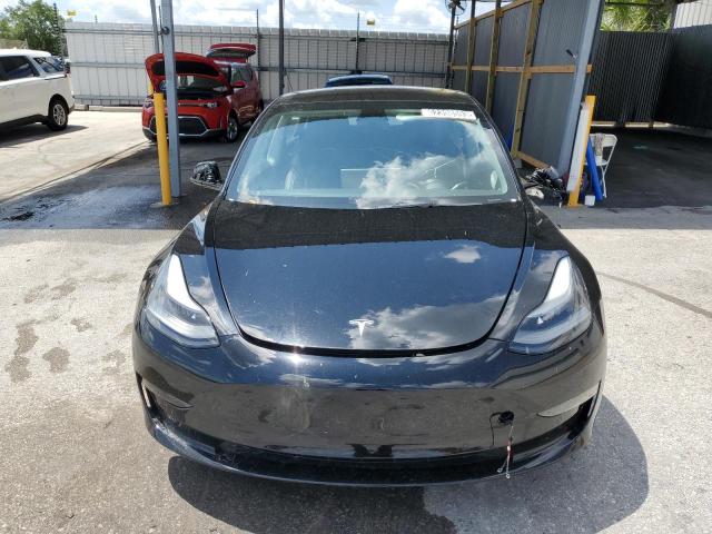 Photo 5 from auction – 2022 TESLA MODEL 3 with VIN 5YJ3E1EBXNF188579