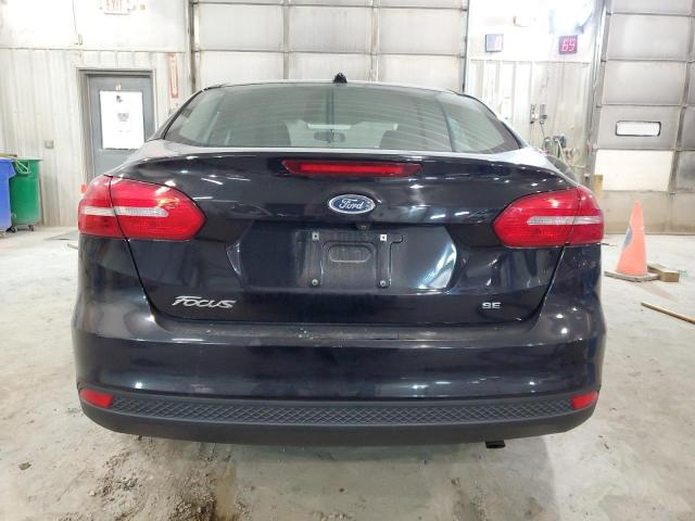 Foto 6 de la subasta – 2018 FORD FOCUS SE con VIN 1FADP3F23JL324315