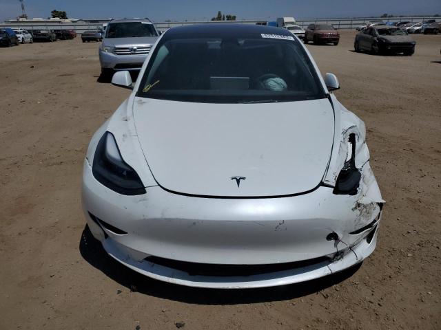 Photo 5 from auction – 2022 TESLA MODEL 3 with VIN 5YJ3E1EB7NF170153
