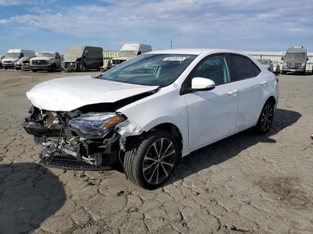 TOYOTA COROLLA L 2019 with VIN 5YFBURHE9KP943790 - Photo from auction