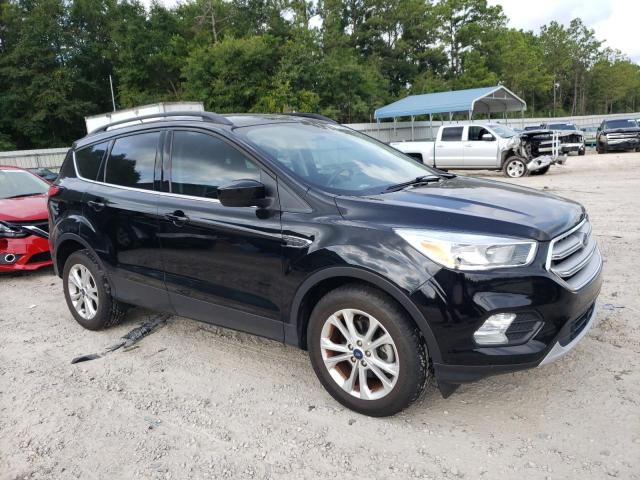 Photo 4 from auction – 2018 FORD ESCAPE SE with VIN 1FMCU0GD7JUC84985