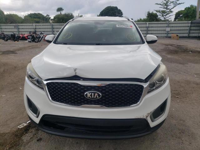 Photo 5 from auction – 2016 KIA SORENTO LX with VIN 5XYPG4A33GG090940
