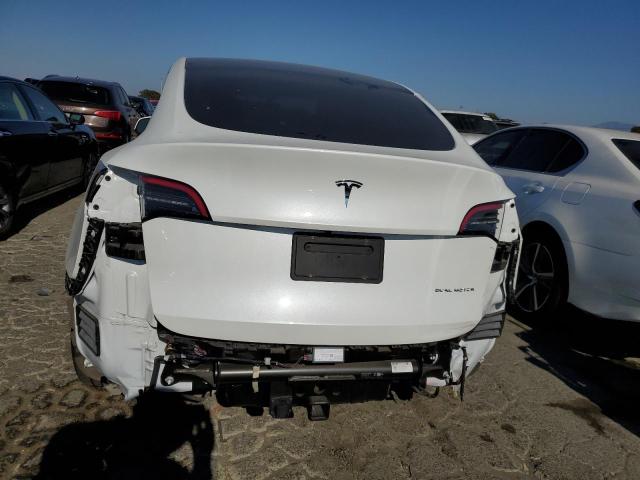 Photo 6 from auction – 2021 TESLA MODEL Y with VIN 5YJYGAEE5MF196906