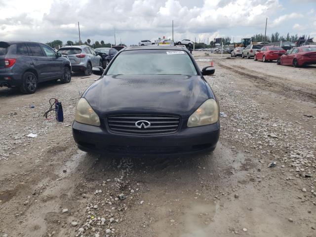 Photo 5 from auction – 2002 INFINITI Q45 with VIN JNKBF01A32M005752