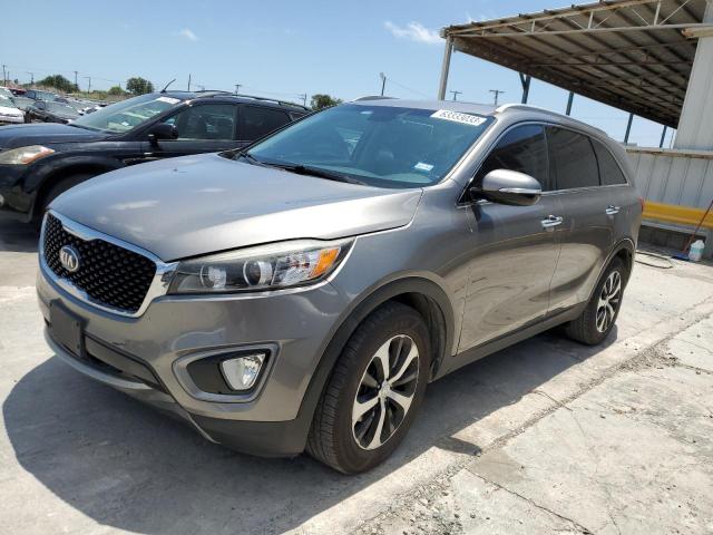 KIA SORENTO EX 2016 with VIN 5XYPH4A10GG005208 - Photo from auction