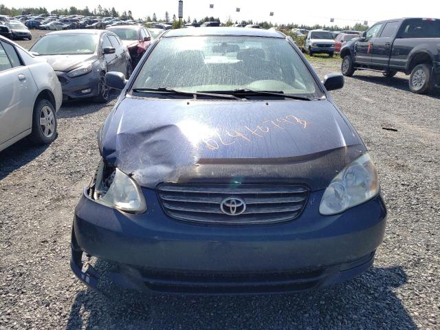 Снимка 5 от търг – 2003 TOYOTA COROLLA CE с VIN 2T1BR32E13C704064