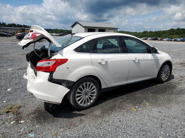 Photo 3 from auction – 2012 FORD FOCUS TITA with VIN 1FAHP3J2XCL335842