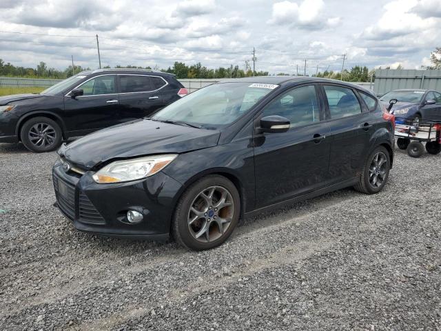 FORD FOCUS SE 2014 with VIN 1FADP3K22EL303130 - Photo from auction