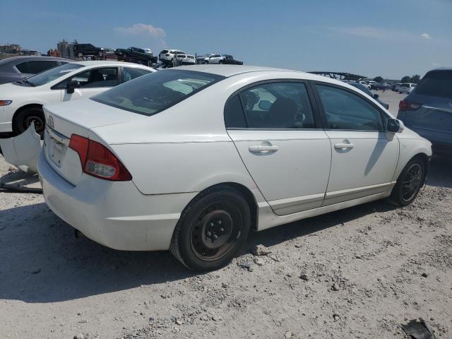 Photo 3 from auction – 2011 HONDA CIVIC LX with VIN 19XFA1F57BE016884