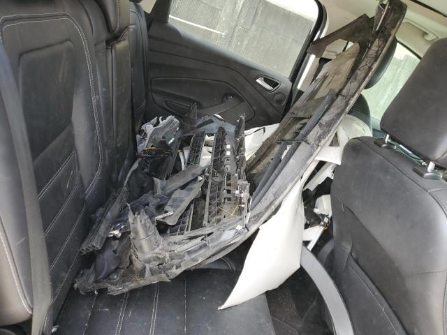 Photo 13 from auction – 2019 FORD ESCAPE TIT with VIN 1FMCU9J99KUC04063