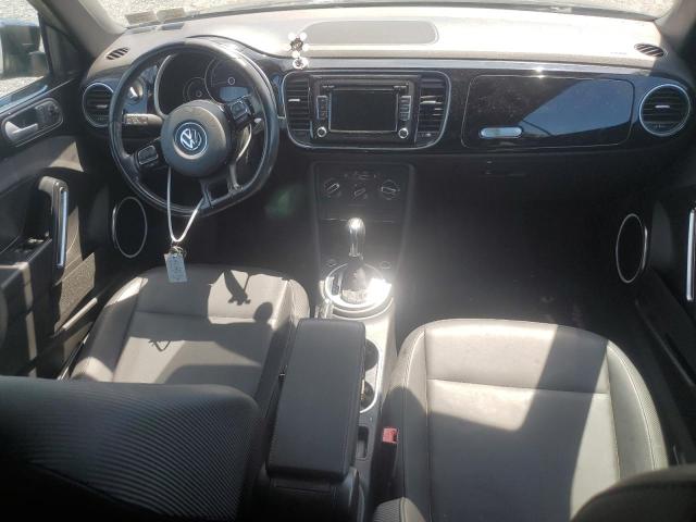 Photo 8 from auction – 2014 VOLKSWAGEN BEETLE with VIN 3VW517AT5EM818703