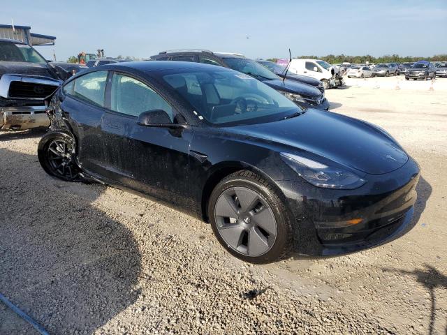 Photo 4 from auction – 2023 TESLA MODEL 3 with VIN 5YJ3E1EA1PF454114