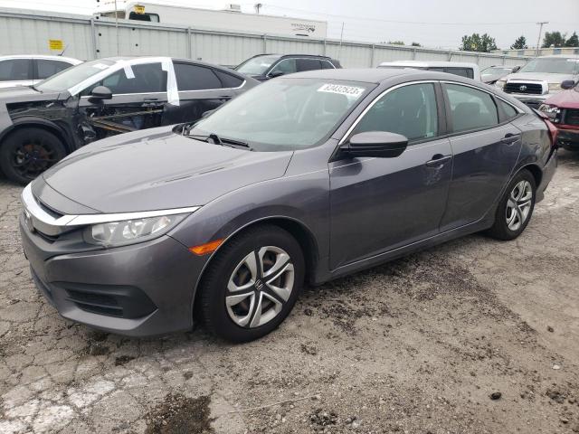 HONDA CIVIC LX 2018 with VIN 19XFC2F56JE037112 - Photo from auction