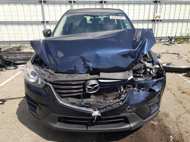 Photo 5 from auction – 2016 MAZDA CX-5 SPORT with VIN JM3KE2BY1G0696037