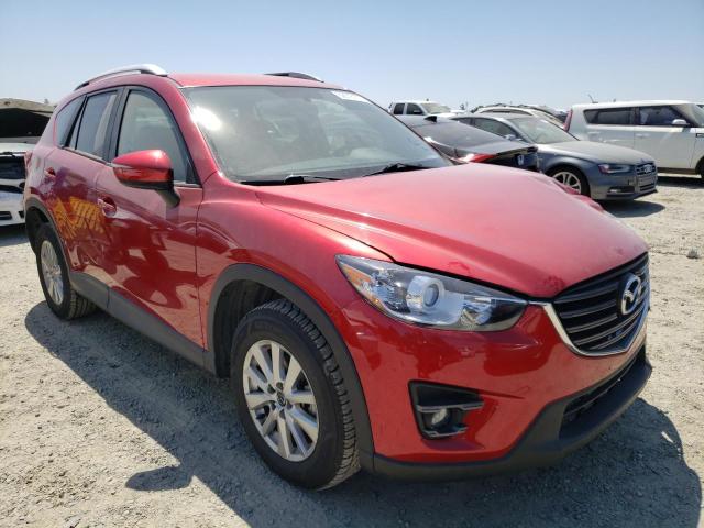 Photo 4 from auction – 2016 MAZDA CX-5 TOURI with VIN JM3KE2CY2G0831993