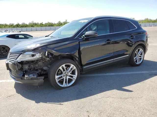 LINCOLN MKC 2015 with VIN 5LMTJ2AH5FUJ18839 - Photo from auction