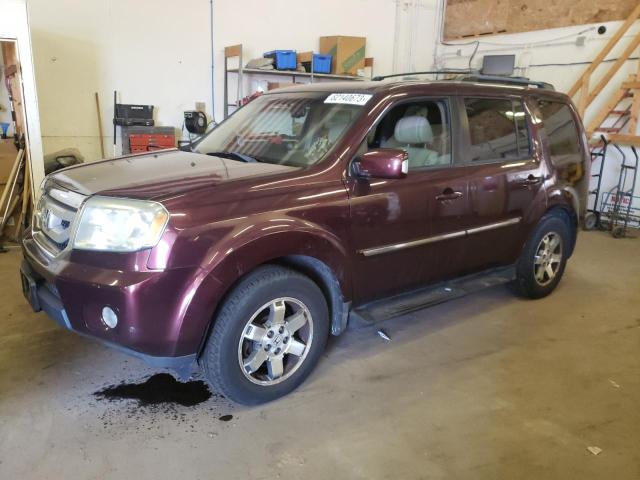 HONDA PILOT TOUR 2010 with VIN 5FNYF4H90AB018402 - Photo from auction