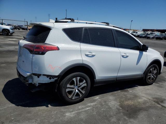 Photo 3 from auction – 2018 TOYOTA RAV4 LE with VIN 2T3ZFREV8JW481871