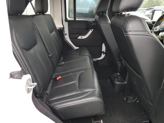 Photo 11 from auction – 2014 JEEP WRANGLER U with VIN 1C4BJWEGXEL198929