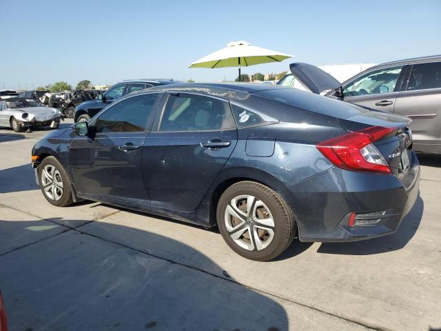 Photo 2 from auction – 2018 HONDA CIVIC LX with VIN 19XFC2F50JE006079