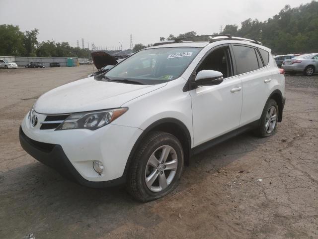 TOYOTA RAV4 XLE 2014 with VIN JTMRFREV3EJ012319 - Photo from auction