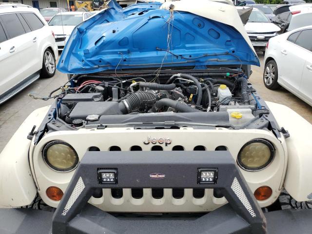 Photo 12 from auction – 2011 JEEP WRANGLER U with VIN 1J4BA3H11BL565504