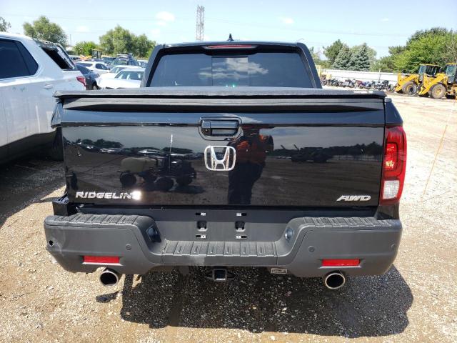 Photo 6 from auction – 2022 HONDA RIDGELINE with VIN 5FPYK3F86NB022810