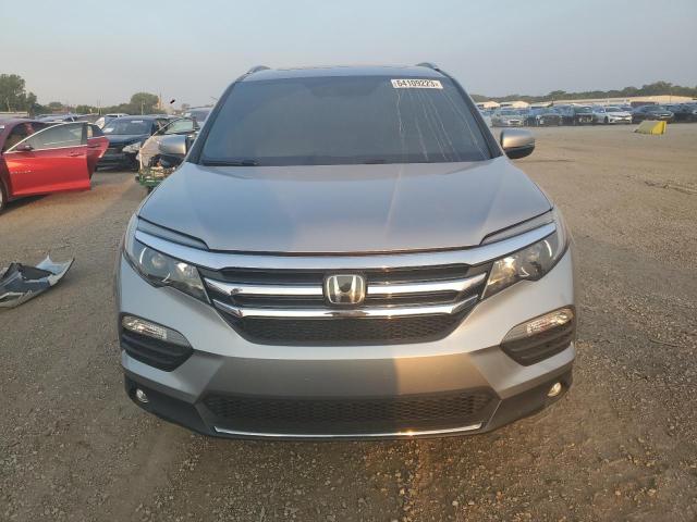 Photo 5 from auction – 2017 HONDA PILOT TOUR with VIN 5FNYF6H90HB002822