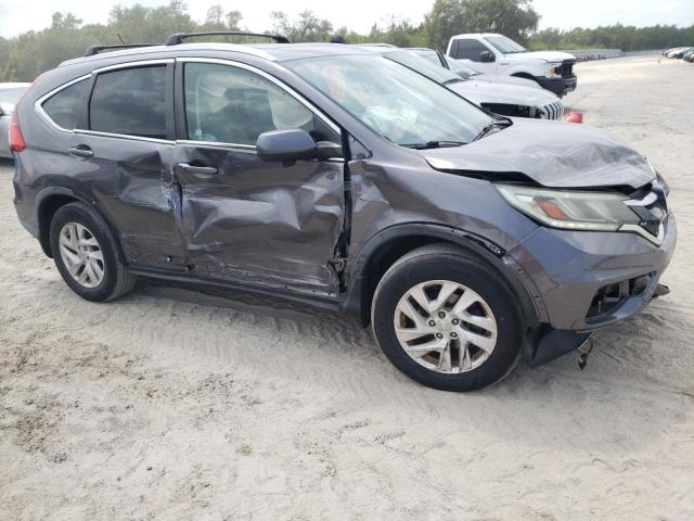 Photo 4 from auction – 2015 HONDA CR-V with VIN 2HKRM4H59FH619629