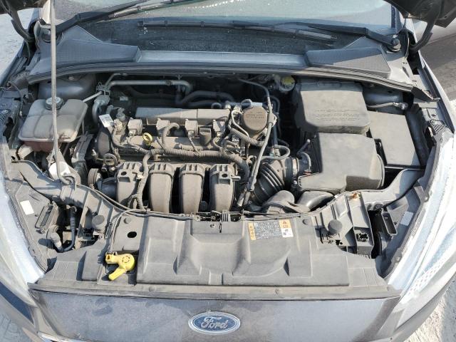 Photo 11 from auction – 2015 FORD FOCUS SE with VIN 1FADP3F26FL375167