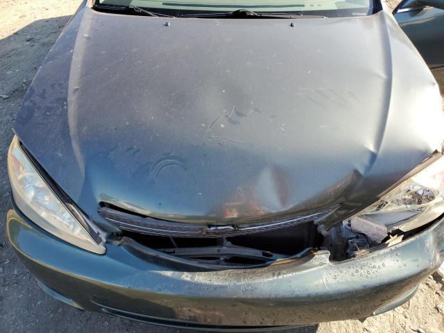 Photo 11 from auction – 2003 TOYOTA CAMRY LE with VIN JTDBE32K530160471