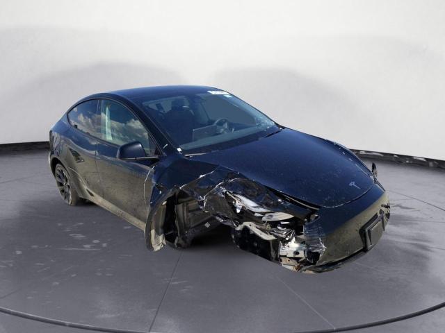 Снимка 4 от търг – 2022 TESLA MODEL Y с VIN 7SAYGDEE8NF480973