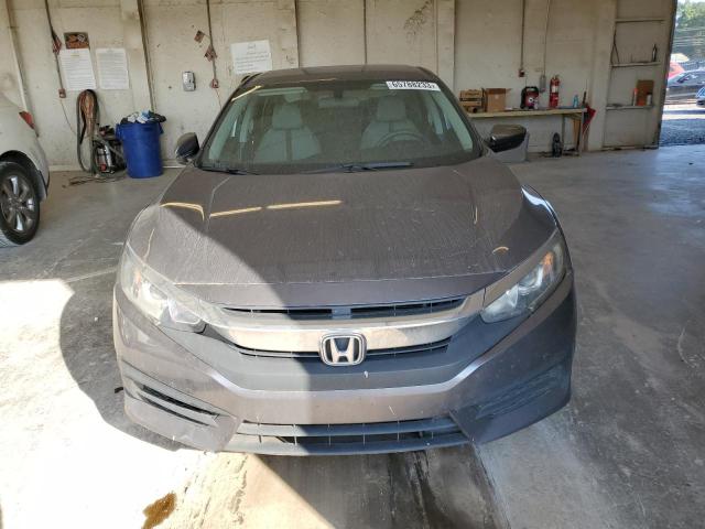 Photo 5 from auction – 2018 HONDA CIVIC LX with VIN 19XFC2F59JE033121
