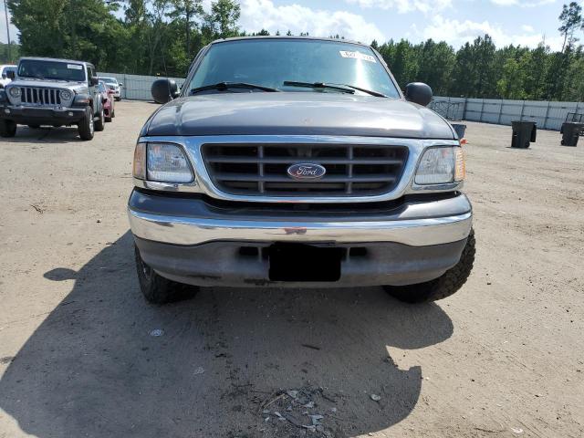 Photo 5 from auction – 2003 FORD F150 SUPER with VIN 1FTRW07673KD15371
