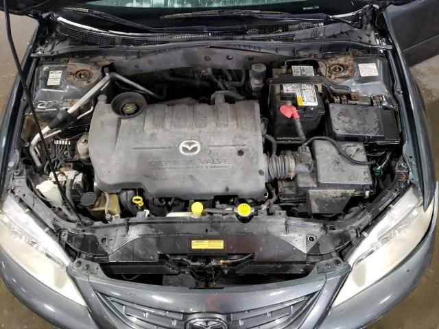Photo 11 from auction – 2003 MAZDA 6 I with VIN 1YVHP80C535M51224