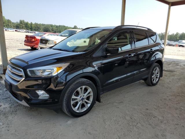 FORD ESCAPE SE 2018 with VIN 1FMCU9GD3JUB92681 - Photo from auction
