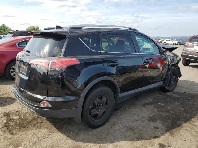Photo 3 from auction – 2017 TOYOTA RAV4 LE with VIN 2T3BFREV1HW579121