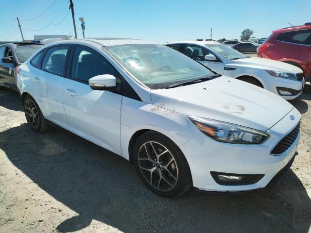 Photo 4 from auction – 2018 FORD FOCUS SEL with VIN 1FADP3H23JL304577