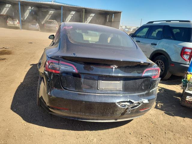 Снимка 6 от търг – 2021 TESLA MODEL 3 с VIN 5YJ3E1EAXMF089637