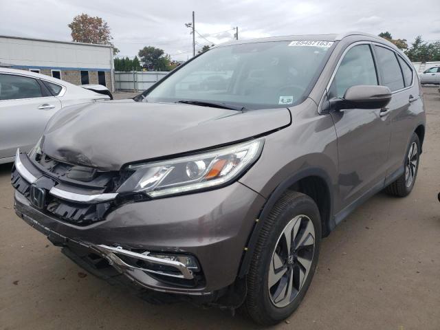 HONDA CR-V TOURI 2015 with VIN 5J6RM4H98FL097777 - Photo from auction