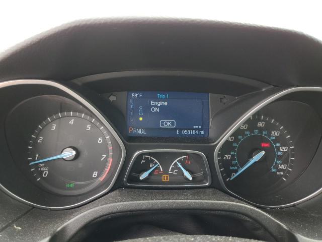 Foto 9 de la subasta – 2014 FORD FOCUS SE con VIN 1FADP3F28EL293925