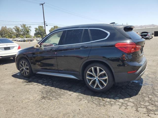 Photo 2 from auction – 2017 BMW X1 XDRIVE2 with VIN WBXHT3C38H5F78174