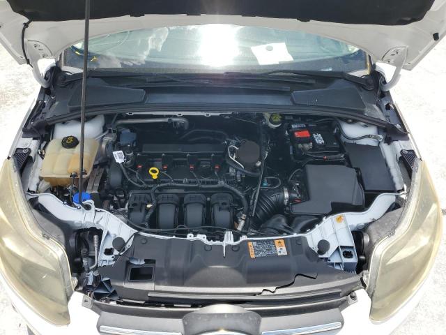 Photo 11 from auction – 2014 FORD FOCUS SE with VIN 1FADP3K2XEL417232