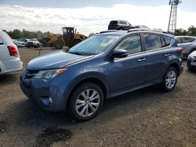 TOYOTA RAV4 LIMIT 2014 with VIN JTMDFREV2ED091703 - Photo from auction