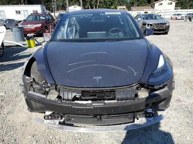 Photo 5 from auction – 2021 TESLA MODEL 3 with VIN 5YJ3E1EA1MF100699