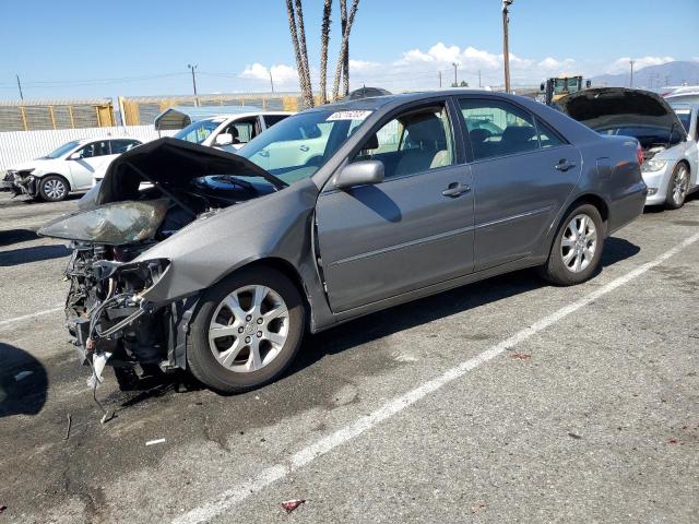 TOYOTA CAMRY LE 2005 with VIN 4T1BF30K65U607106 - Photo from auction