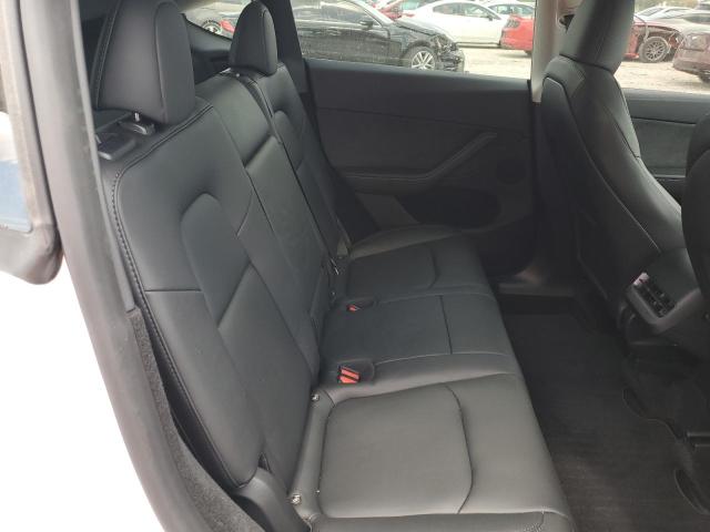 Photo 11 from auction – 2023 TESLA MODEL Y with VIN 7SAYGDEE2PA116063