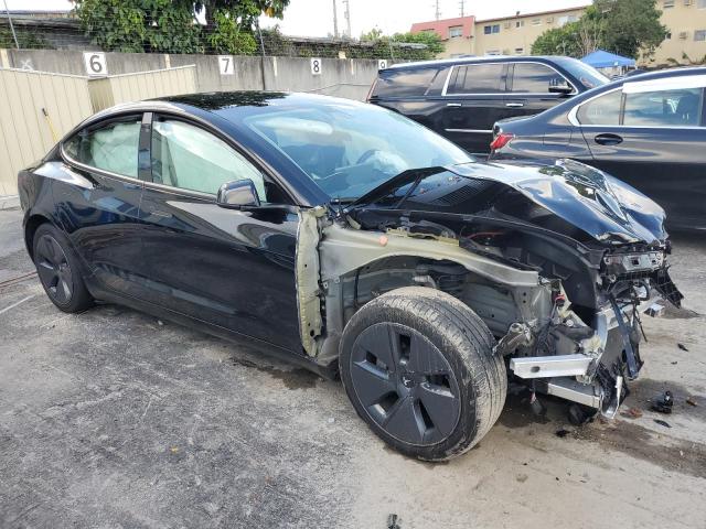 Photo 4 from auction – 2022 TESLA MODEL 3 with VIN 5YJ3E1EB2NF288742