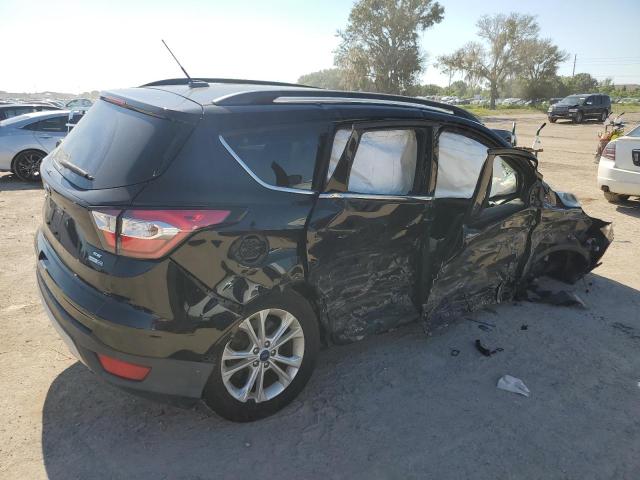 Photo 3 from auction – 2018 FORD ESCAPE SE with VIN 1FMCU9GDXJUA73185